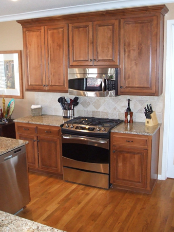 Crown molding on this Upper Cabinet - better than Cabinet refinishing or refacing